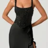 Abito a corsetto con volant decorati Robina in nero Abito a corsetto con volant decorati Robina in nero