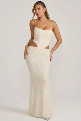 Abito a corsetto drappeggiato con cut-out decorato Saphira in bianco