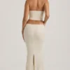 Abito a corsetto drappeggiato con cut-out decorato Saphira in bianco Abito a corsetto drappeggiato con cut-out decorato Saphira in bianco
