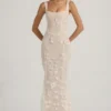 Abito corsetto con scollo morbido e applicazioni decorative Vasanta in bianco Abito corsetto con scollo morbido e applicazioni decorative Vasanta in bianco