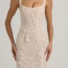 Abito corsetto con scollo morbido e applicazioni decorative Vasanta in bianco Abito corsetto con scollo morbido e applicazioni decorative Vasanta in bianco