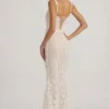 Abito corsetto con scollo morbido e applicazioni decorative Vasanta in bianco Abito corsetto con scollo morbido e applicazioni decorative Vasanta in bianco