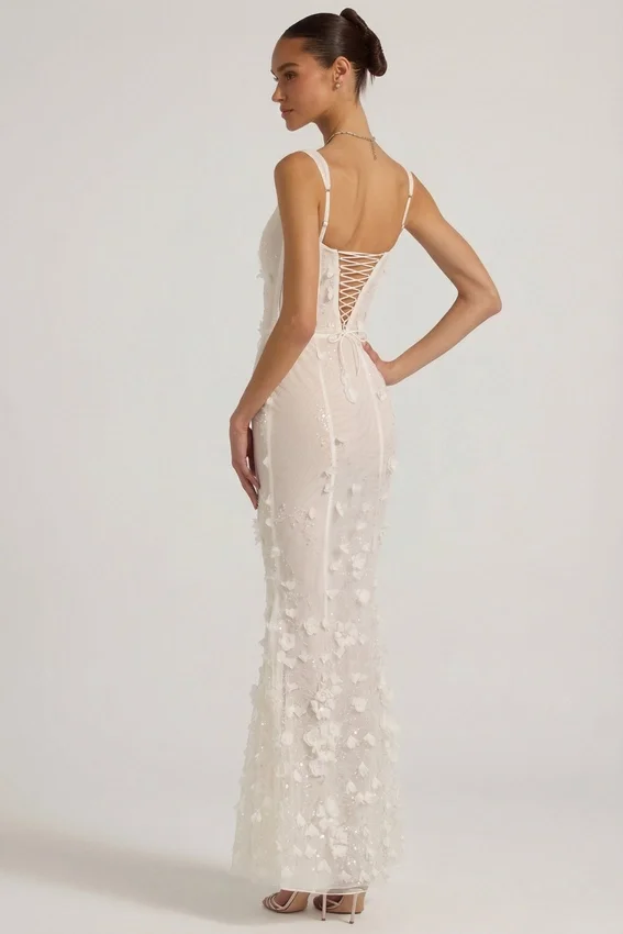 Abito corsetto con scollo morbido e applicazioni decorative Vasanta in bianco Abito corsetto con scollo morbido e applicazioni decorative Vasanta in bianco