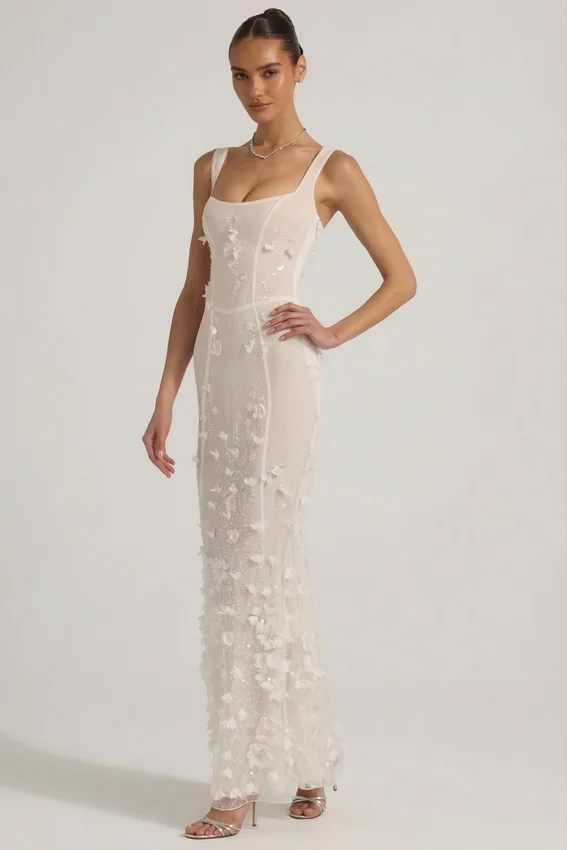 Abito corsetto con scollo morbido e applicazioni decorative Vasanta in bianco Abito corsetto con scollo morbido e applicazioni decorative Vasanta in bianco