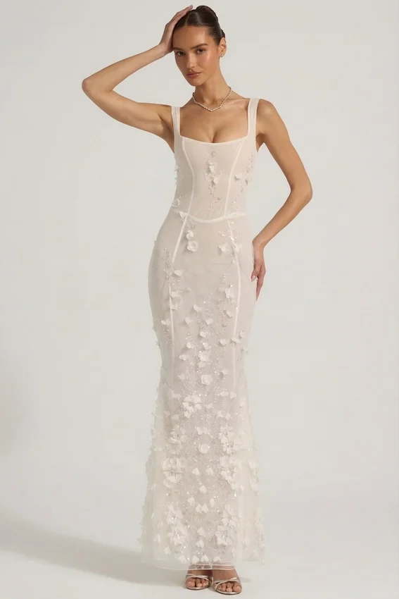 Abito corsetto con scollo morbido e applicazioni decorative Vasanta in bianco Abito corsetto con scollo morbido e applicazioni decorative Vasanta in bianco