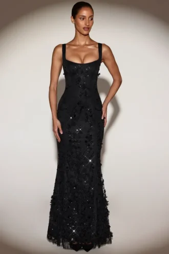 Abito corsetto con scollo morbido e applicazioni decorative Vasanta in nero Abito corsetto con scollo morbido e applicazioni decorative Vasanta in nero