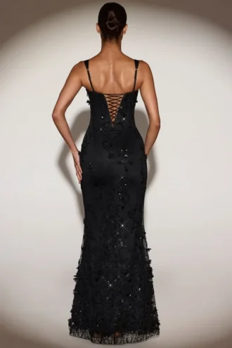 Abito corsetto con scollo morbido e applicazioni decorative Vasanta in nero Abito corsetto con scollo morbido e applicazioni decorative Vasanta in nero