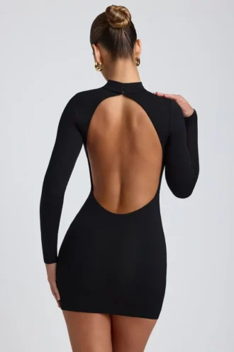 Abito corto a maniche lunghe con schiena scoperta Yara in Modal nero Abito corto a maniche lunghe con schiena scoperta Yara in Modal nero