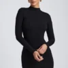 Abito corto a maniche lunghe con schiena scoperta Yara in Modal nero Abito corto a maniche lunghe con schiena scoperta Yara in Modal nero