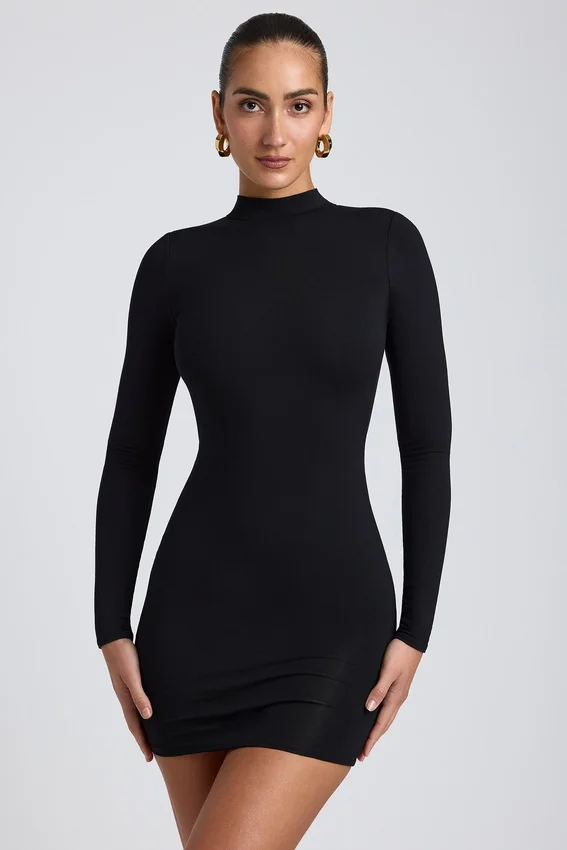 Abito corto a maniche lunghe con schiena scoperta Yara in Modal nero Abito corto a maniche lunghe con schiena scoperta Yara in Modal nero