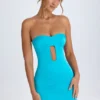 Abito corto aderente a fascia con cut-out Nikko in turchese Abito corto aderente a fascia con cut-out Nikko in turchese