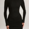 Abito corto drappeggiato con scollo a barchetta e maniche lunghe in modal Eska, colore nero Abito corto drappeggiato con scollo a barchetta e maniche lunghe in modal Eska, colore nero