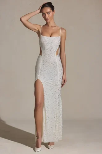 Abito lungo a sirena con cut-out decorato Lucienne in bianco