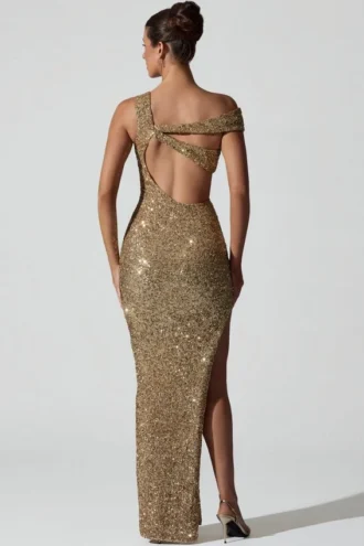 Abito lungo asimmetrico con cut-out e decorazioni Persephone in oro