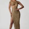 Abito lungo asimmetrico con cut-out e decorazioni Persephone in oro Abito lungo asimmetrico con cut-out e decorazioni Persephone in oro
