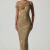 Abito lungo asimmetrico con cut-out e decorazioni Persephone in oro Abito lungo asimmetrico con cut-out e decorazioni Persephone in oro