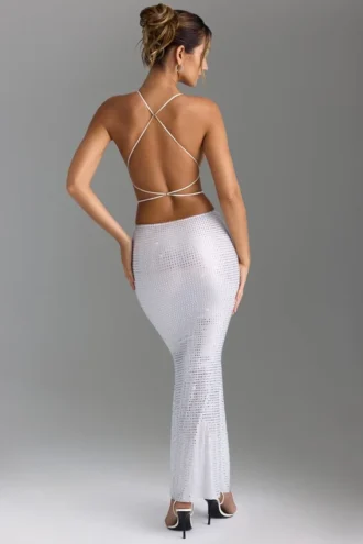 Abito lungo con cut-out e decorazioni sulla schiena Magdalena in bianco Abito lungo con cut-out e decorazioni sulla schiena Magdalena in bianco