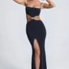 Abito lungo con cut-out e dettagli metallici Julitta in nero Abito lungo con cut-out e dettagli metallici Julitta in nero