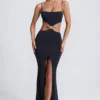 Abito lungo con cut-out e dettagli metallici Julitta in nero Abito lungo con cut-out e dettagli metallici Julitta in nero