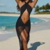 Abito lungo con scollo all’americana e cut-out Caicos in nero Abito lungo con scollo all’americana e cut-out Caicos in nero