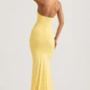 Abito lungo con scollo all’americana e drappeggi sulla schiena Laverna in giallo pastello Abito lungo con scollo all’americana e drappeggi sulla schiena Laverna in giallo pastello