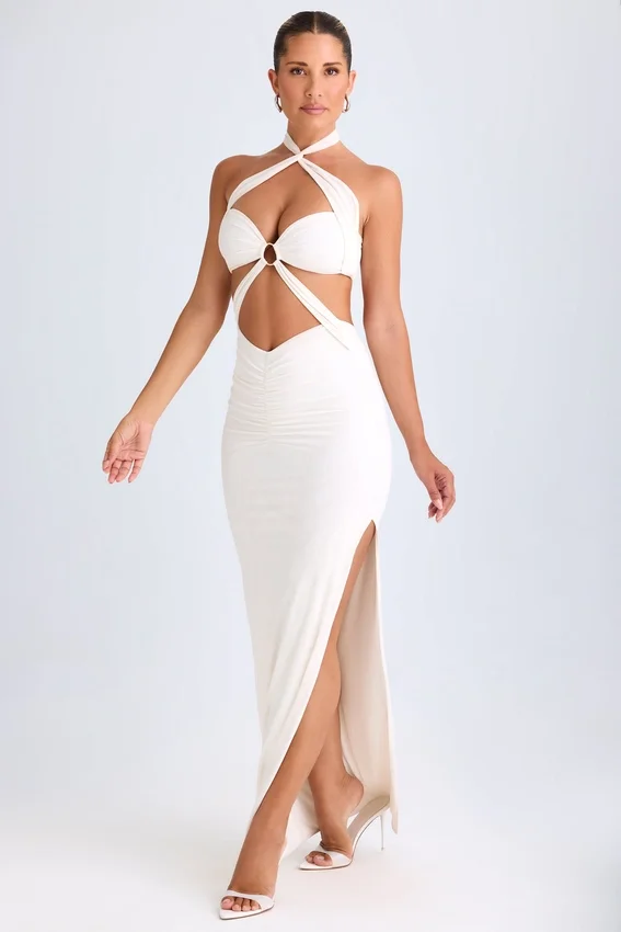 Abito lungo con scollo all’americana e ruches con cut-out Kalyani in bianco Abito lungo con scollo all’americana e ruches con cut-out Kalyani in bianco