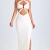 Abito lungo con scollo all’americana e ruches con cut-out Kalyani in bianco Abito lungo con scollo all’americana e ruches con cut-out Kalyani in bianco