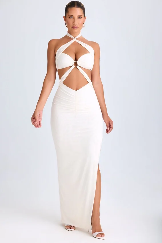 Abito lungo con scollo all’americana e ruches con cut-out Kalyani in bianco Abito lungo con scollo all’americana e ruches con cut-out Kalyani in bianco