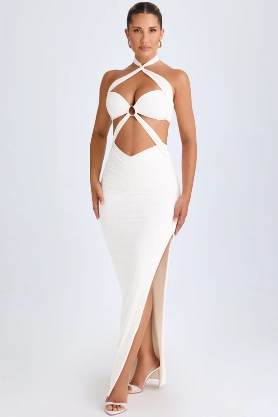 Abito lungo con scollo all’americana e ruches con cut-out Kalyani in bianco Abito lungo con scollo all’americana e ruches con cut-out Kalyani in bianco