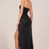 Abito lungo drappeggiato con fascia Matilde in nero Abito lungo drappeggiato con fascia Matilde in nero