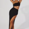 Abito lungo monospalla con cut-out Ishtar in nero Abito lungo monospalla con cut-out Ishtar in nero