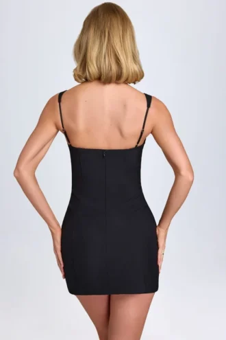 Abito micro mini Amaria con scollo a cuore in nero