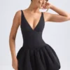 Abito micro mini con corsetto e orlo a palloncino allacciato Anahita in nero