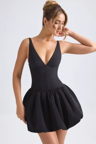 Abito micro mini con corsetto e orlo a palloncino allacciato Anahita in nero