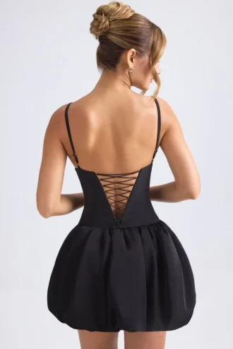 Abito micro mini con corsetto e orlo a palloncino allacciato Anahita in nero