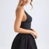 Abito micro mini con corsetto e orlo a palloncino allacciato Anahita in nero