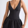 Abito micro mini con corsetto e orlo a palloncino allacciato Anahita in nero