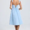 Abito midi drappeggiato con corpetto a corsetto Marguerite in blu polvere
