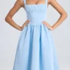 Abito midi drappeggiato con corpetto a corsetto Marguerite in blu polvere