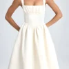 Abito midi drappeggiato con corpetto Marguerite in avorio