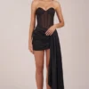 Abito mini a corsetto con allacciatura Norah Bandeau in nero Abito mini a corsetto con allacciatura Norah Bandeau in nero