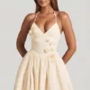 Abito mini a corsetto con applicazioni floreali e scollo all’americana Augusta in avorio