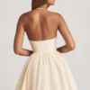 Abito mini a corsetto con applicazioni floreali e scollo all’americana Augusta in avorio