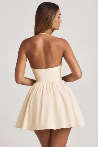 Abito mini a corsetto con applicazioni floreali e scollo all’americana Augusta in avorio