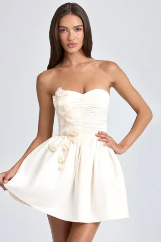 Abito mini a corsetto con applicazioni floreali Mirabelle in avorio