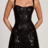 Abito mini A-line con corsetto peekaboo decorato Benedetta in zebrato nero Abito mini A-line con corsetto peekaboo decorato Benedetta in zebrato nero