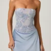 Abito mini drappeggiato senza spalline con decorazioni Eden in azzurro