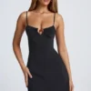 Abito mini svasato Deia con dettagli metallici in nero Abito mini svasato Deia con dettagli metallici in nero