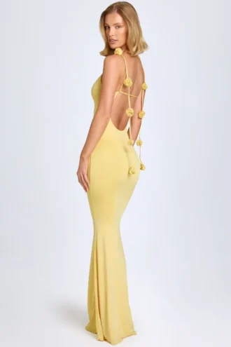 Aldona Abito lungo in jersey elasticizzato con applicazioni floreali in giallo pastello Aldona Abito lungo in jersey elasticizzato con applicazioni floreali in giallo pastello