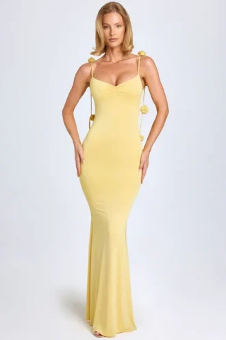 Aldona Abito lungo in jersey elasticizzato con applicazioni floreali in giallo pastello Aldona Abito lungo in jersey elasticizzato con applicazioni floreali in giallo pastello